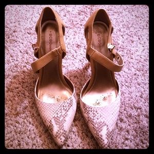 BCBG pointed toe stilettos with unique strap!